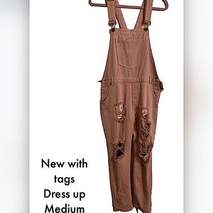New with tags. Overalls from shop impressions.